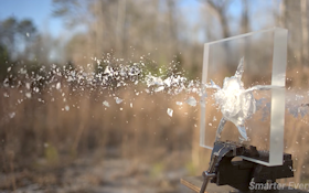 Watch What Happens Between a 50-Caliber Bullet and Ballistic Glass