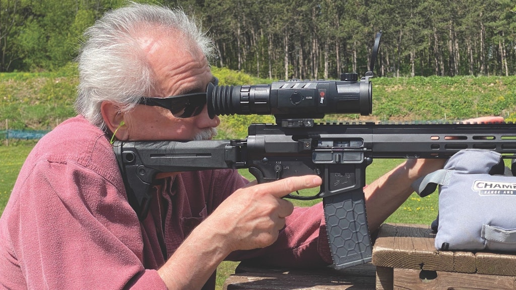 Since thermals detect heat, the units can also be used during the day. Here, Brian McCombie is zeroing a RICO MK1 thermal scope.