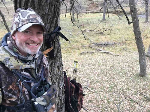 During one memorable morning sit overlooking a decoy, the author and his hunting partner Paul (above) had several bucks circle their two portable treestands, which were 15 feet high. As shown below, when a buck walked downwind of their location, it would lift its nose, smelling the ozone, but not spooking.